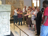 At the Getty Villa, teachers discuss an ancient Roman sarcophagus that depicts scenes from the life of Achilles.
